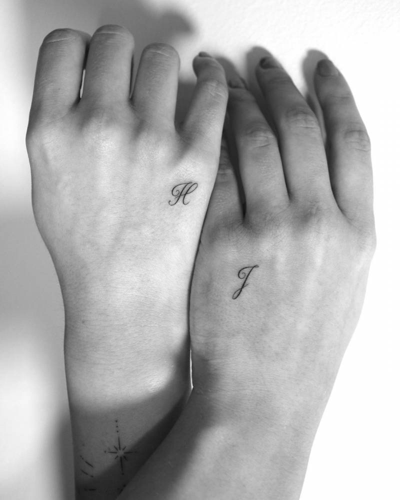 Matching letters "H" and "J" for couple.