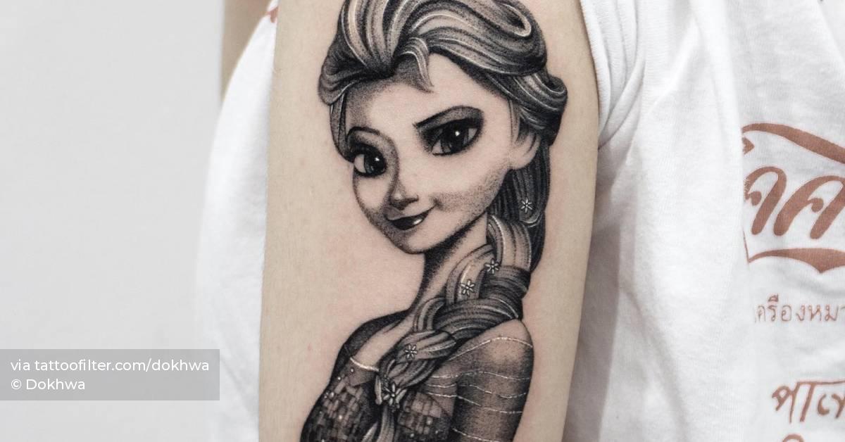 Elsa portrait tattoo located on the upper arm.