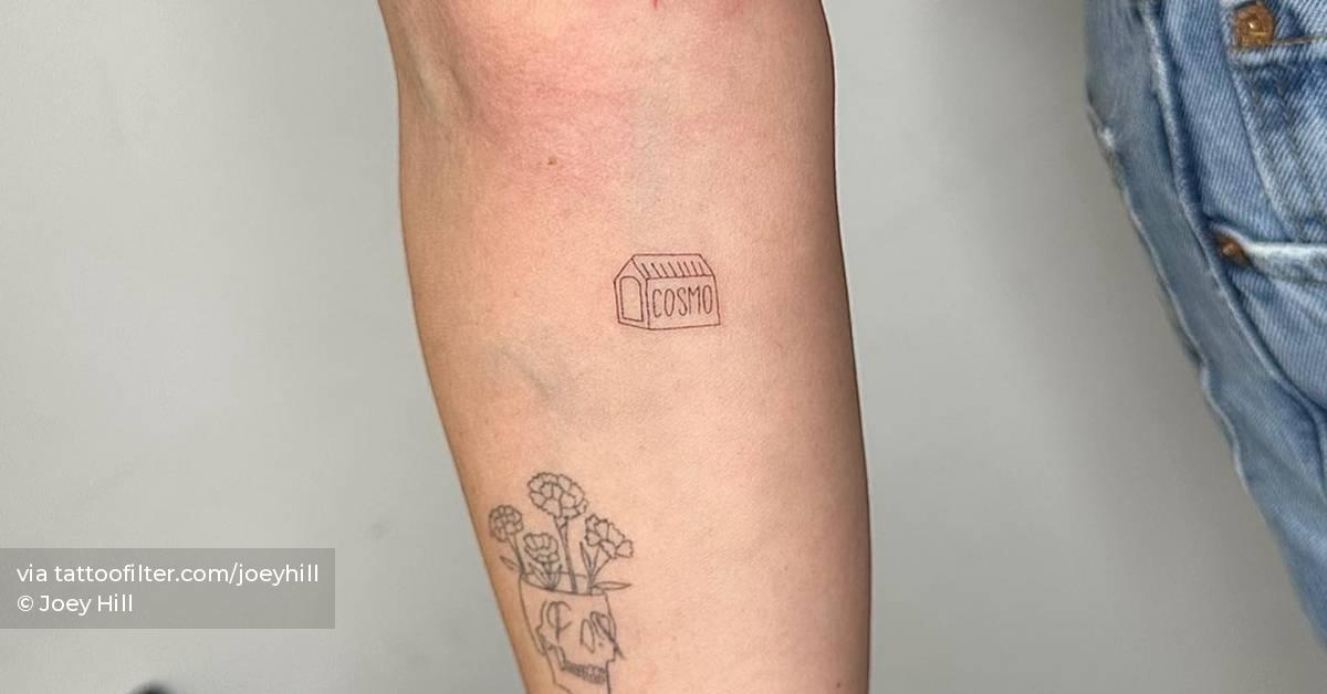 Doghouse tattoo located on the inner forearm, fine line
