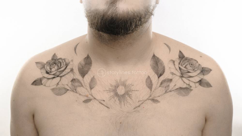Fineline floral collarbone tattoo.