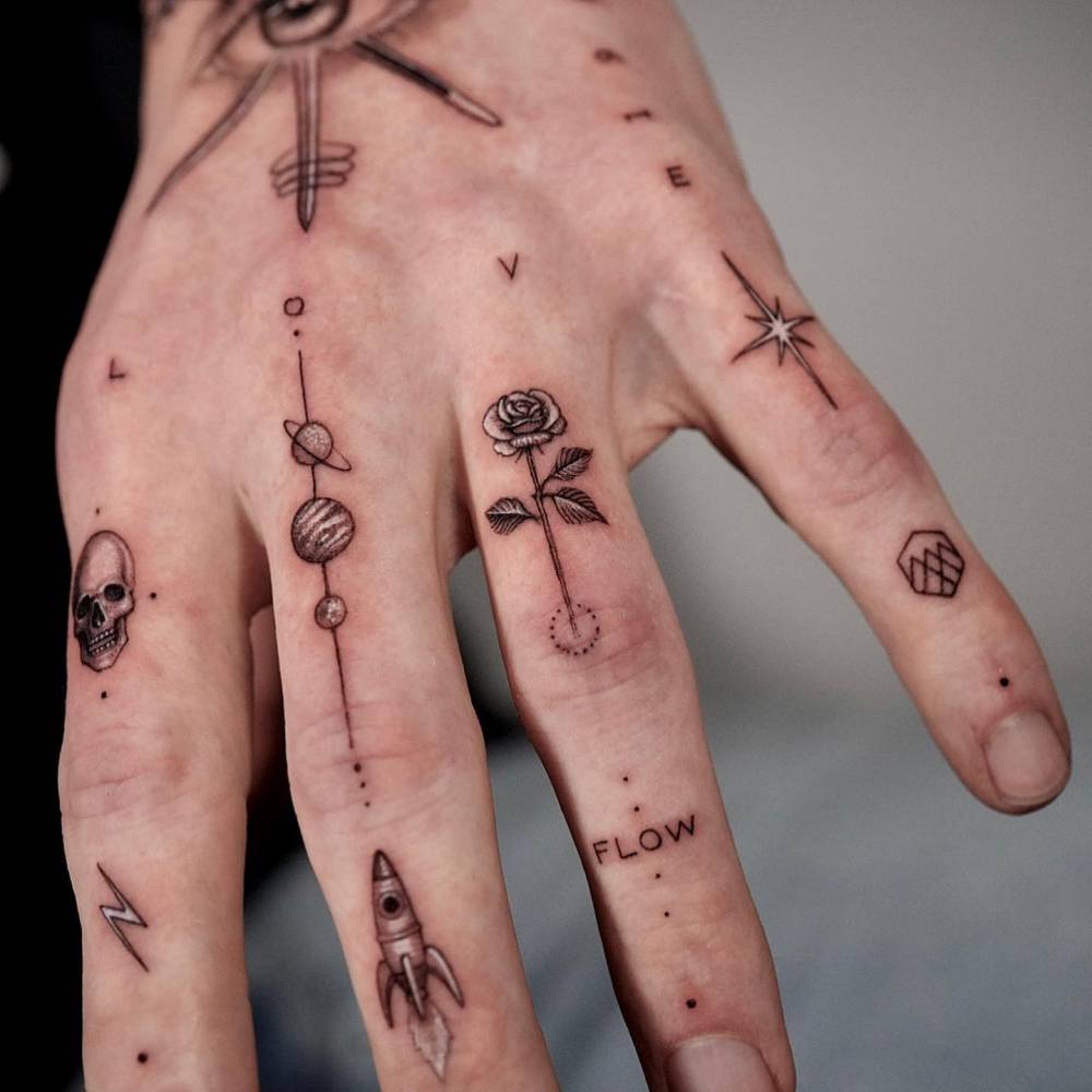 Single needle finger composition tattoos.