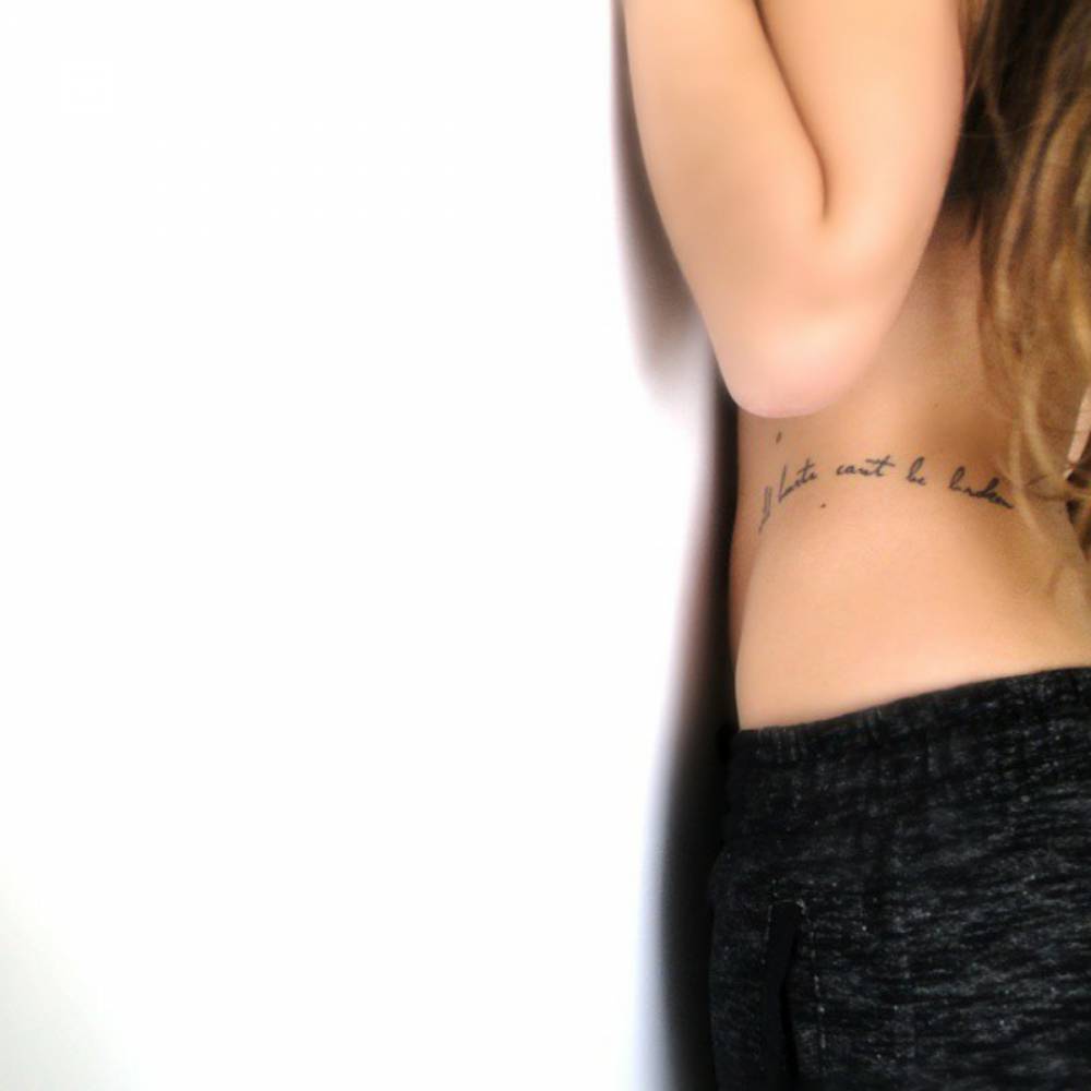 Hip Tattoo Saying “Wild Hearts Can't Be Broken” 1000_x_1000_jpg