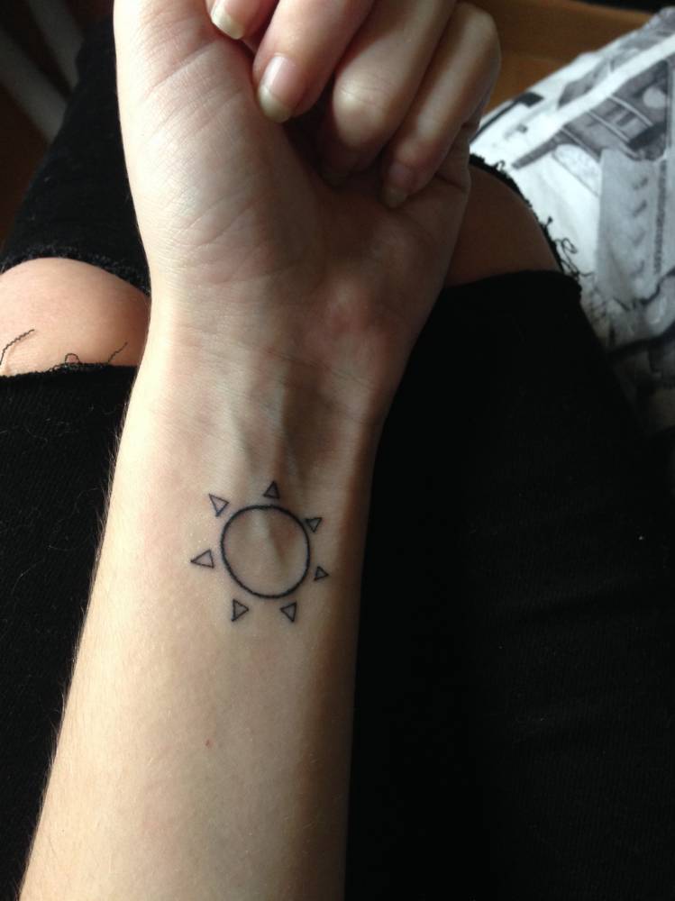 Sun Tattoo On Sophia's Left Wrist: "The Sun Evokes 1000_x_749_jpg