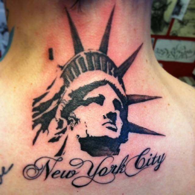 New York city inspired tattoo on the back of the neck.