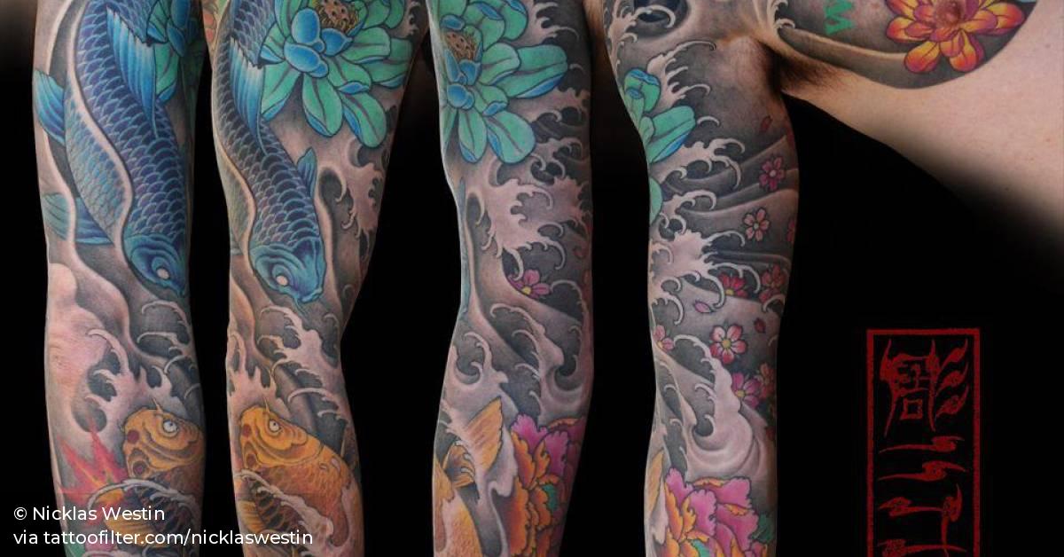 Japanese style sleeve tattoo on the right arm and