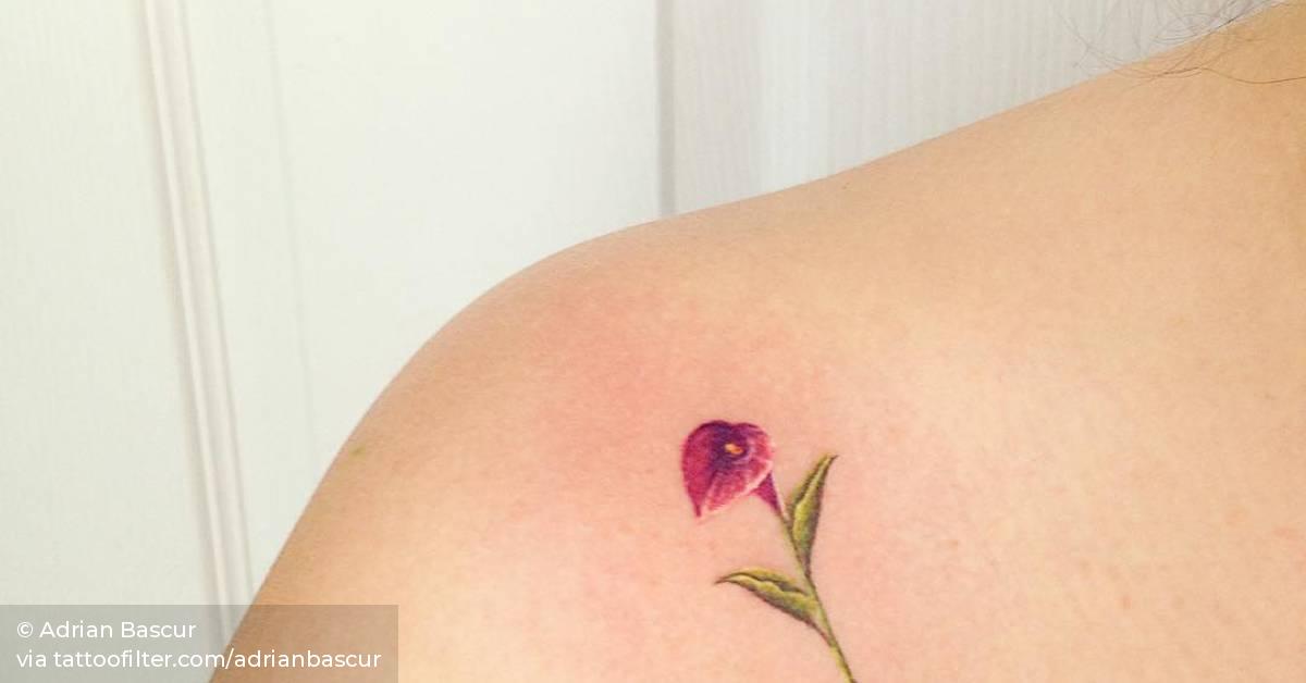 Calla tattoo on the right shoulder.