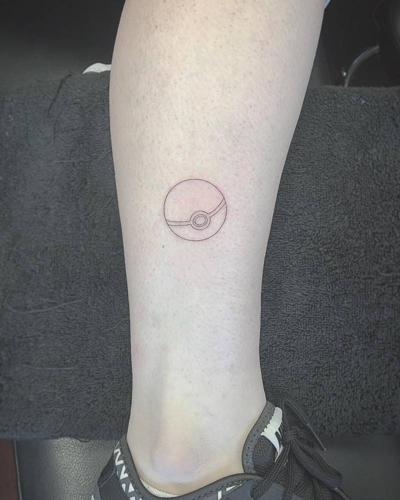 Fine Line Style Pokéball Tattoo On The Left Wrist. 1000_x_800_jpg