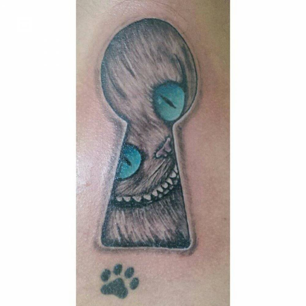 Cheshire Cat Tattoo Looking Through A Keyhole By Levis