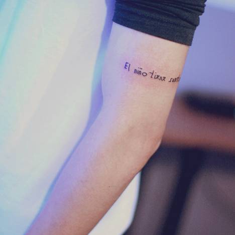 Tricep Tattoo Saying "El Niño Tiene Suerte", Spanish 468_x_468_jpg