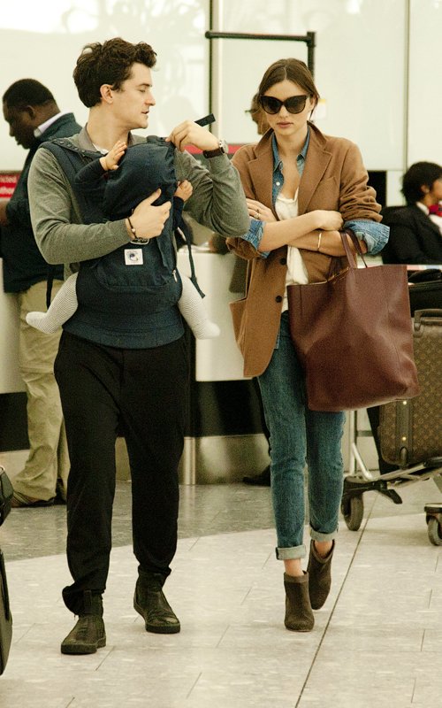 Miranda Kerr and Orlando Bloom with Son Flynn at Heathrow International