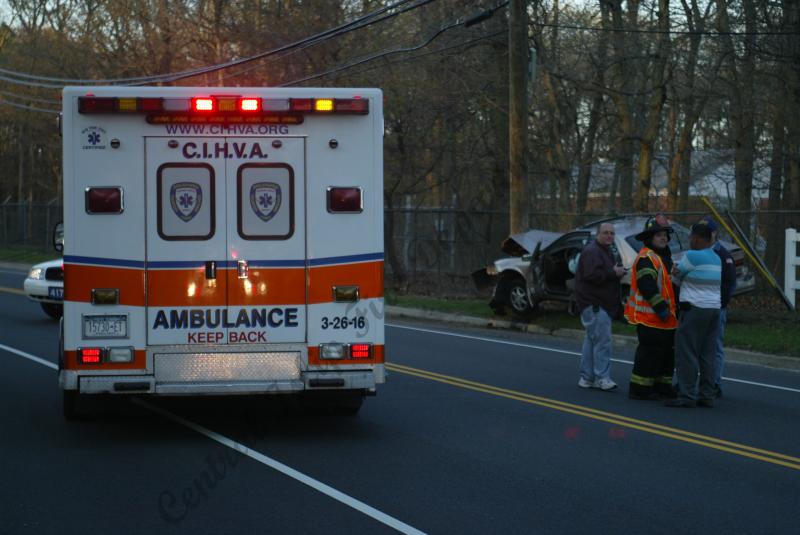 Electrical Hazard turns into car into utility pole Central Islip Fire