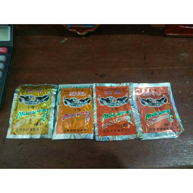 Obat tikus Mao wang hologram berbentuk beras warna pink