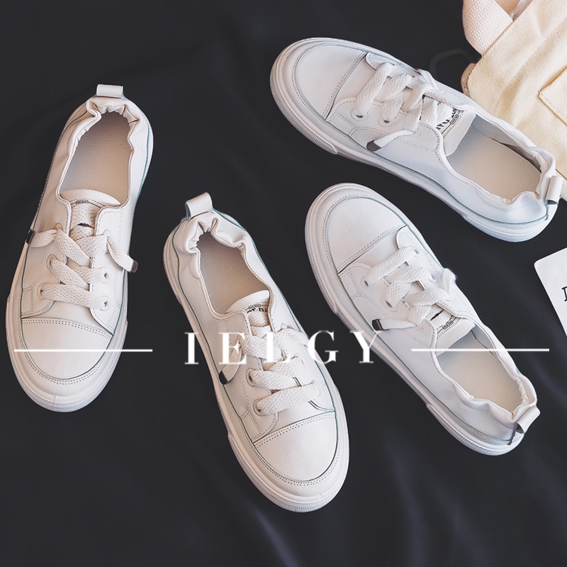 Sepatu Sneakers Wanita Bertali Warna Putih Bahan Kanvas