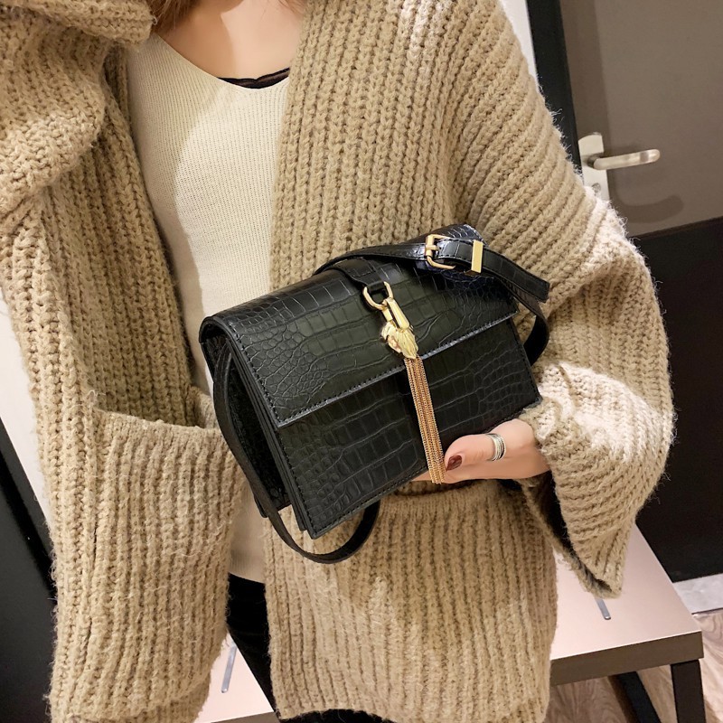 Model tas kulit buaya Guetala untuk wanita