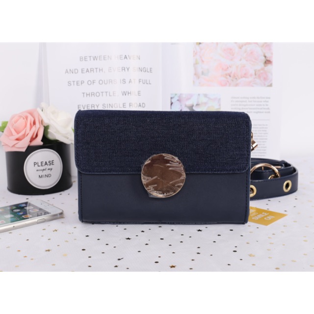 กระเป๋า CHARLES & KEITH CIRCULAR BUCKLE CROSSBODY BAG Shopee Thailand