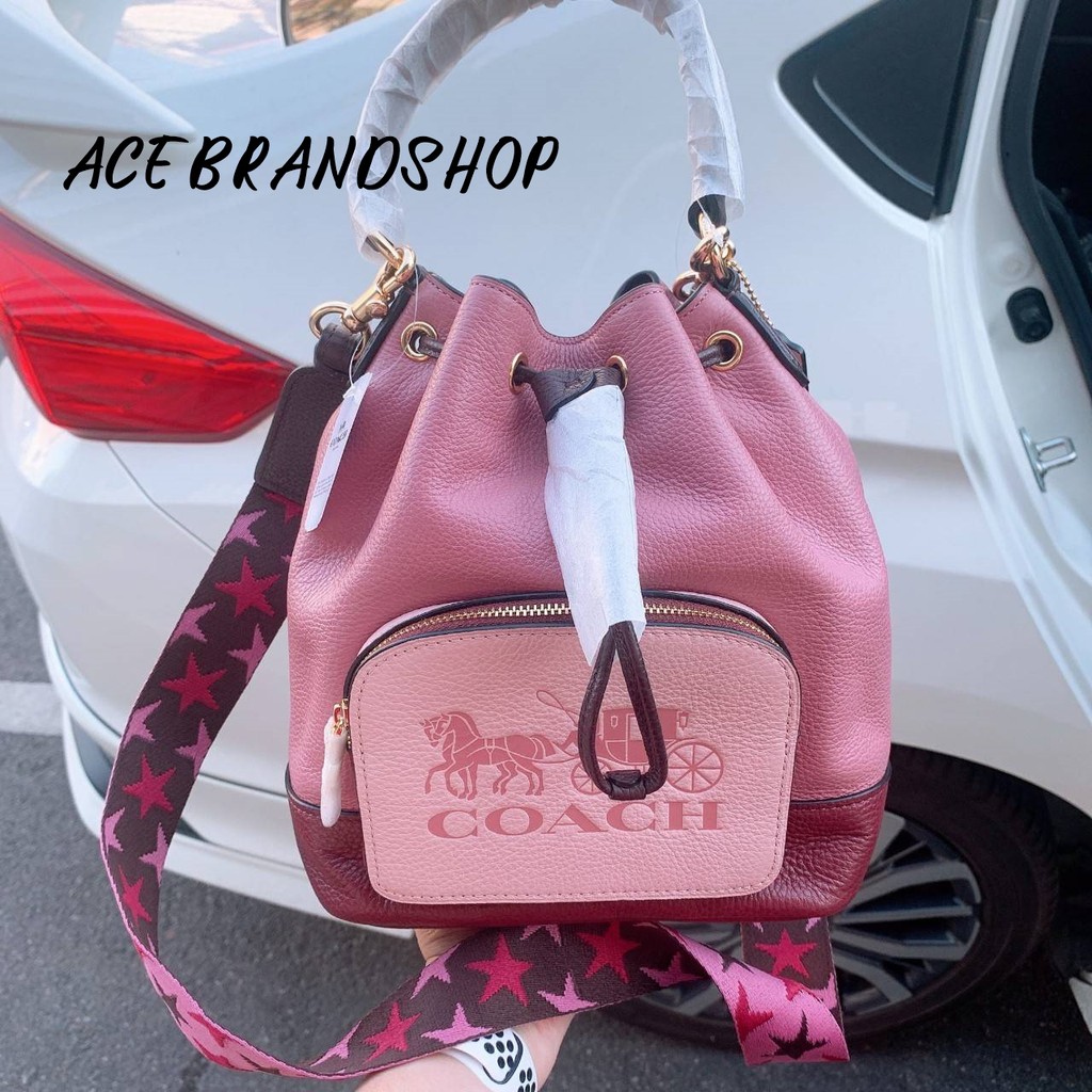 JES DRAWSTRING BUCKET BAG IN COLORBLOCK WITH HORSE AND CARRIAGE (COACH