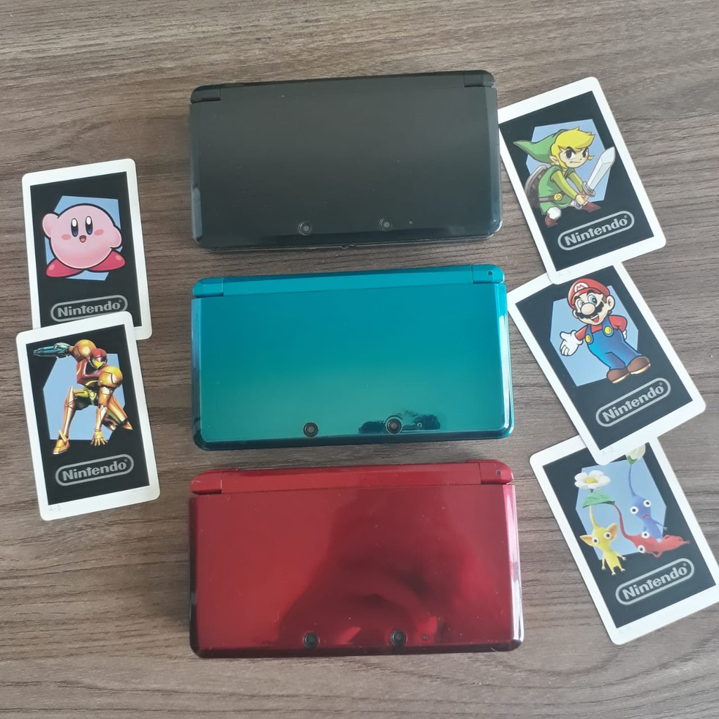 Nintendo 3DS com Cartão de Memória Cheio de Jogos Escorrega o Preço