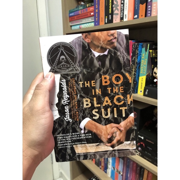 livro the boy in the black suit Shopee Brasil