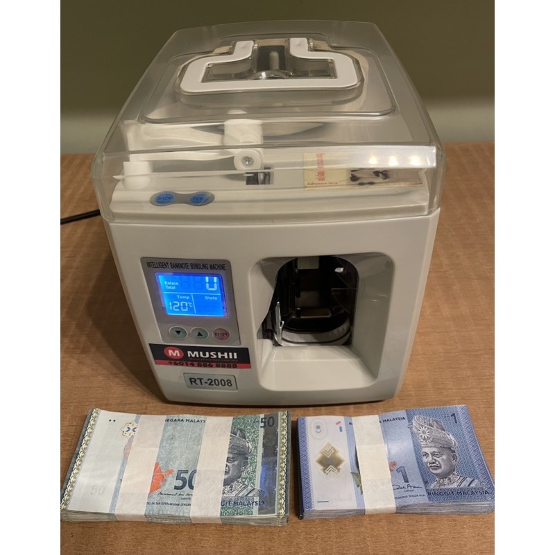 Money Strapping Machine. Money Bundle Bundling Machine. Money Binding