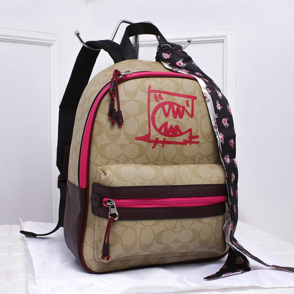 Branded IMORT Bag Co Vale Charlie Backpack in Signature Canvas Rexy