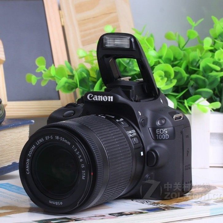 Canon EOS 100D compact digital SLR camera female student entrylevel