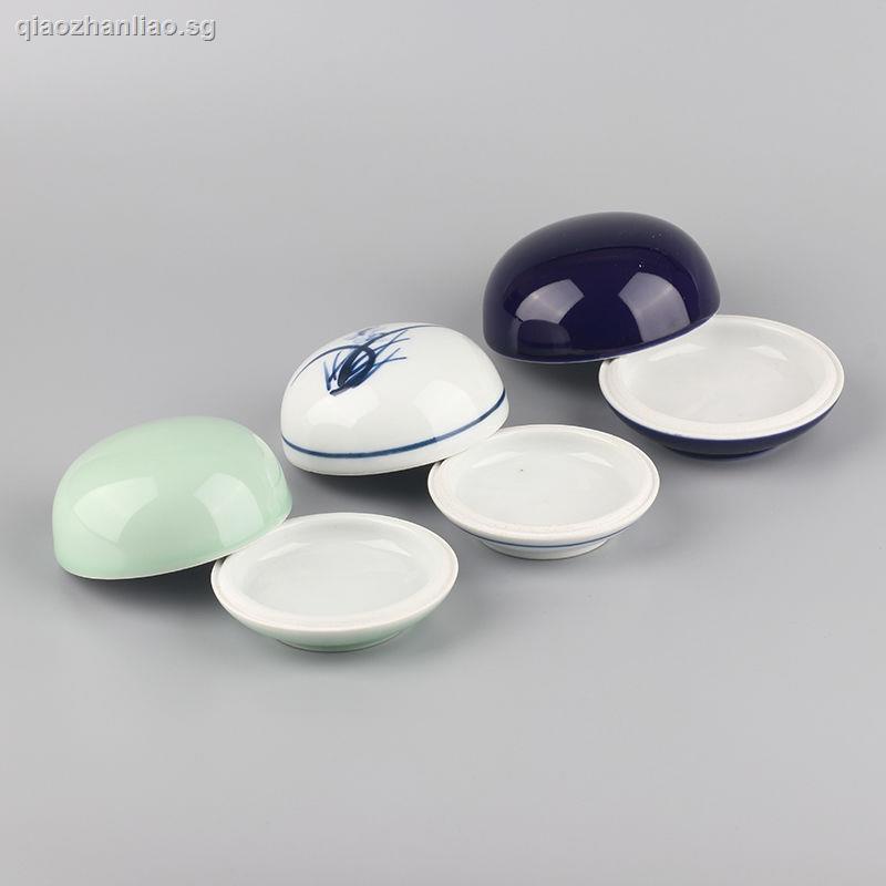 Twodimensional handpainted shadow ceremonial blue ceramic ink pad