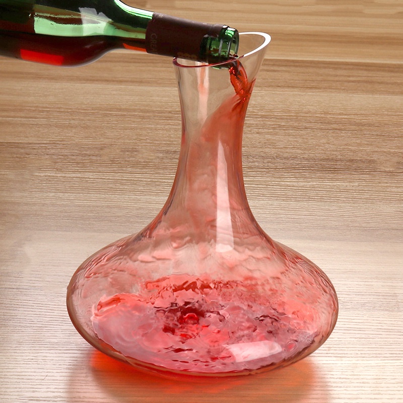 Glass crystal wine dispenser tilting wine jug pouring wine wine
