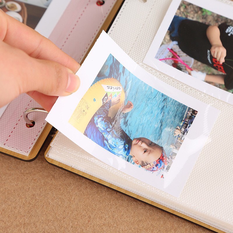 Album 6x9 bìa gỗ đựng được 100 tấm Dụng cụ văn phòng khác Tác giả No