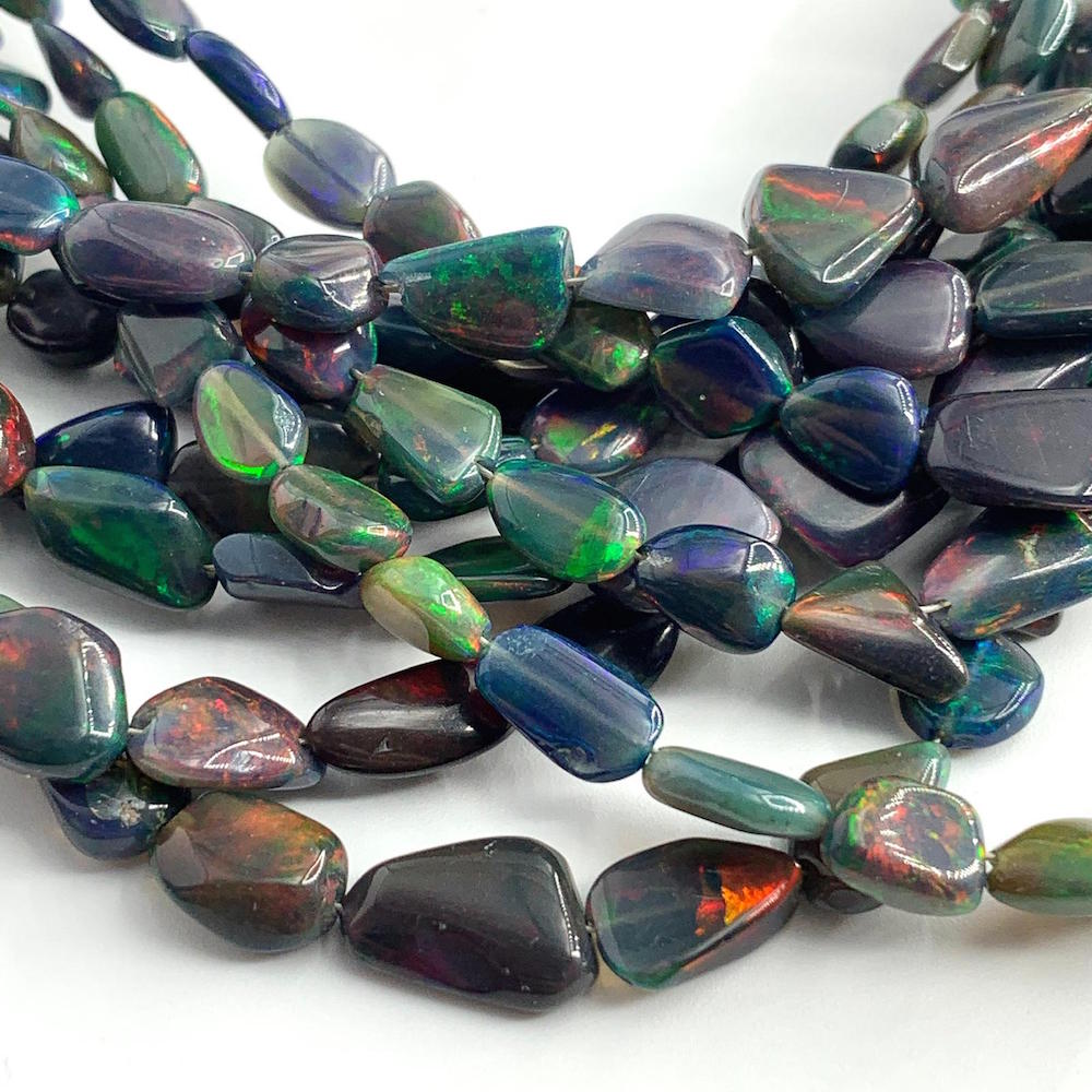 Black Opal Flat Tumbles 12cts Approx 30 Pieces • Chalmers Gems