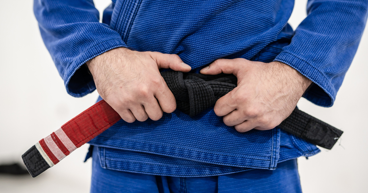 How to Tie a BJJ Belt Mastering the Art of Belt Tying Grappler HQ