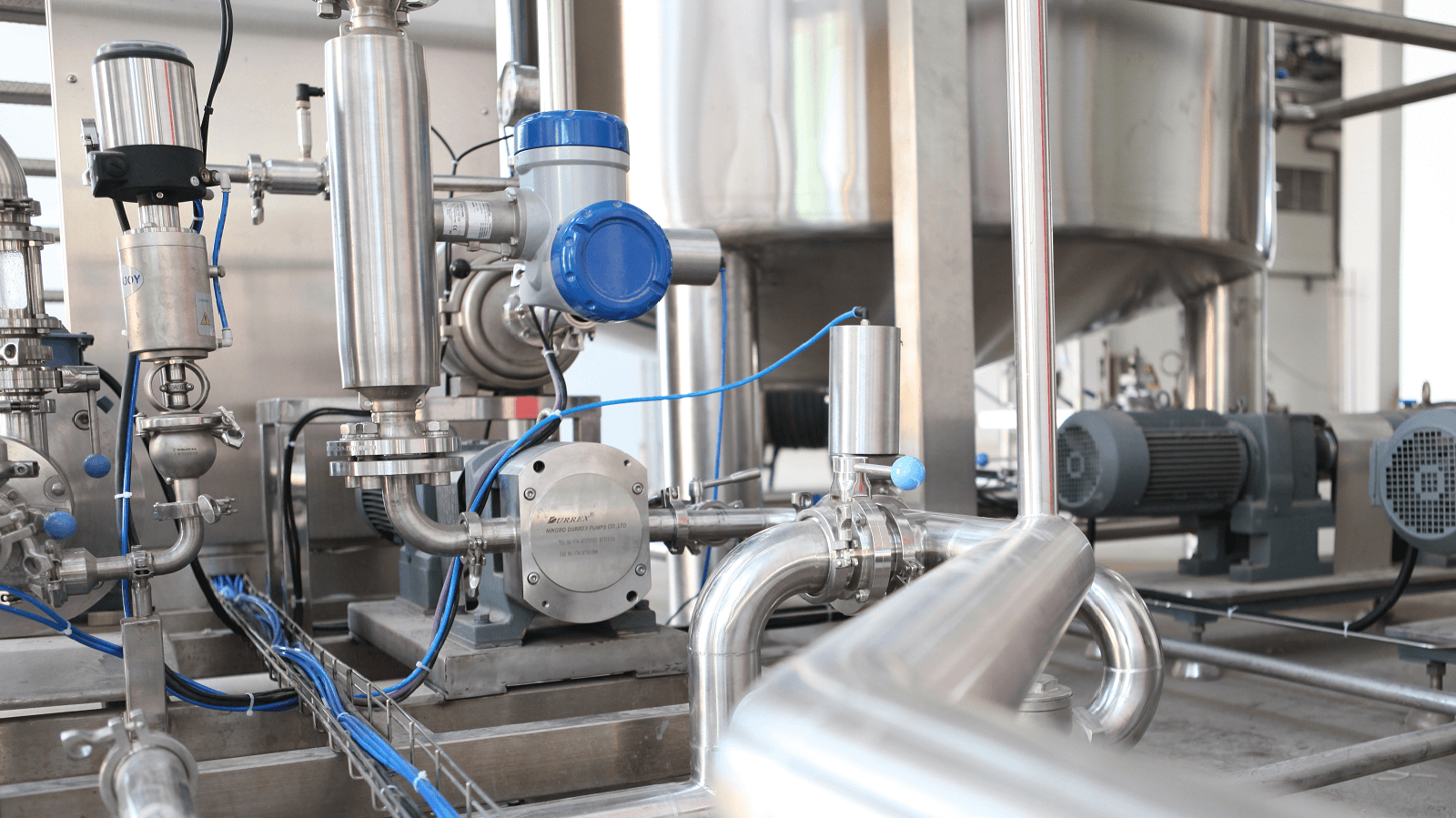 What are the different types of compressors in industrial chillers