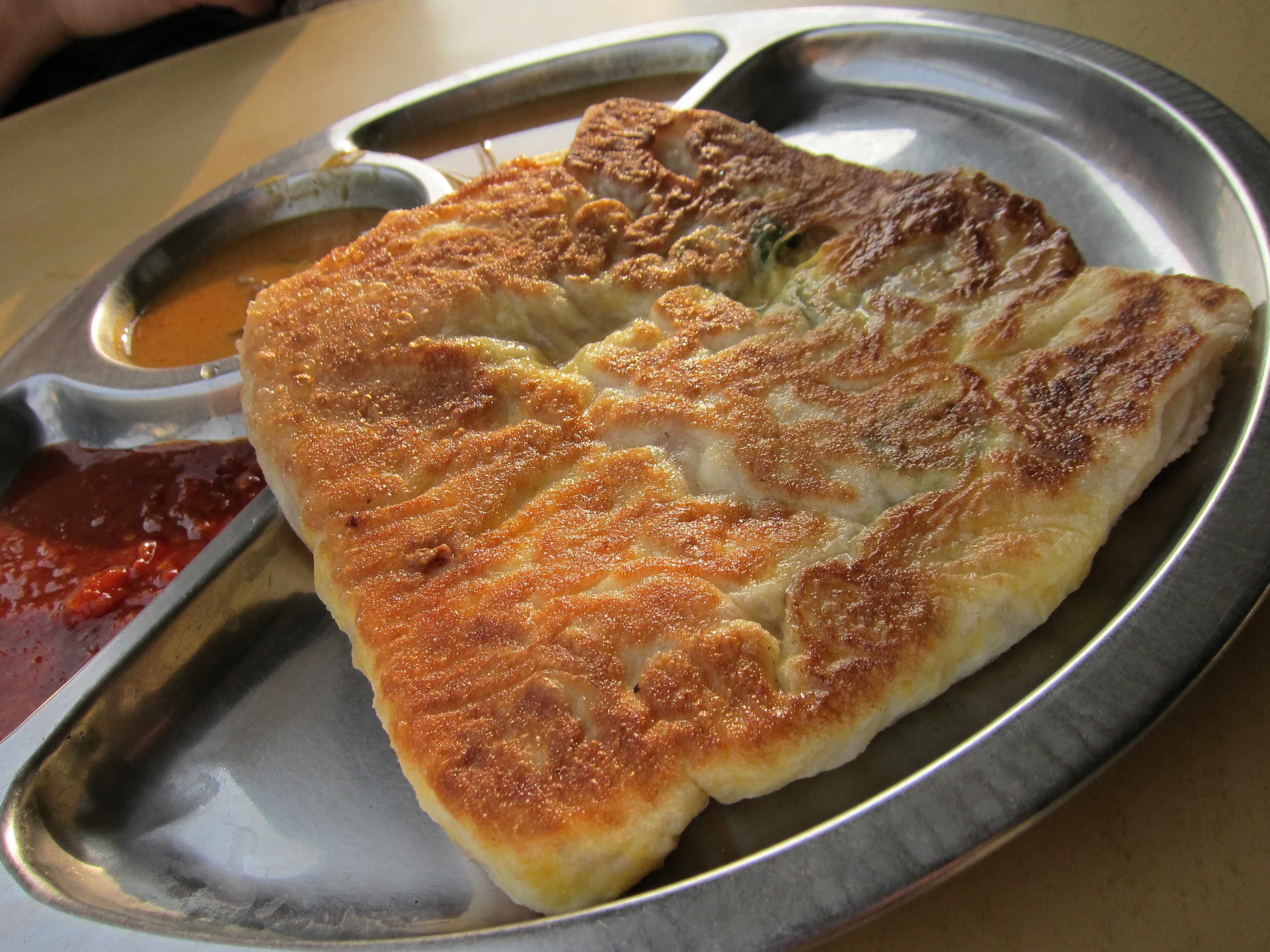 Mr. and Mrs. Mohgan’s Super Crispy Roti Prata (Singapore) Gold