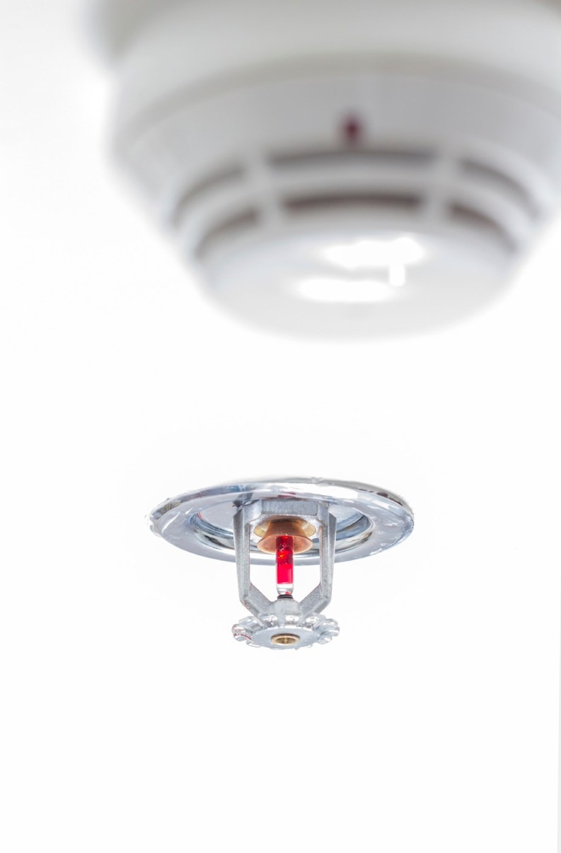Protecting Lives and Property Smoke Detectors and Sprinkler Systems