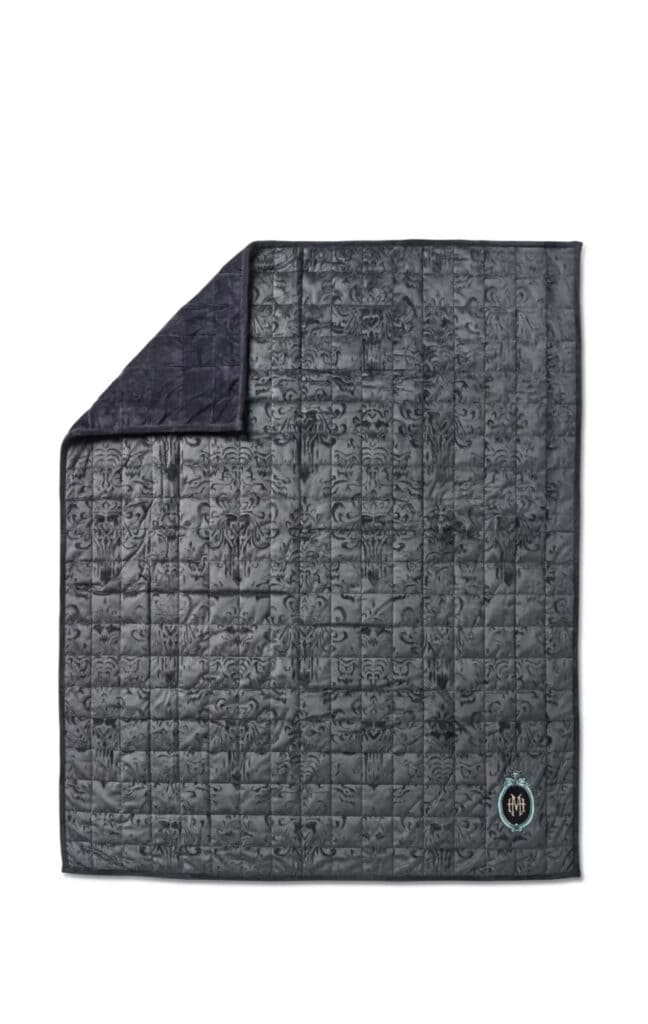 Rest in Peace (and Pieces): The Haunted Mansion Weighted Throw Arrives at the Disney Store! The Haunted Mansion Weighted Throw