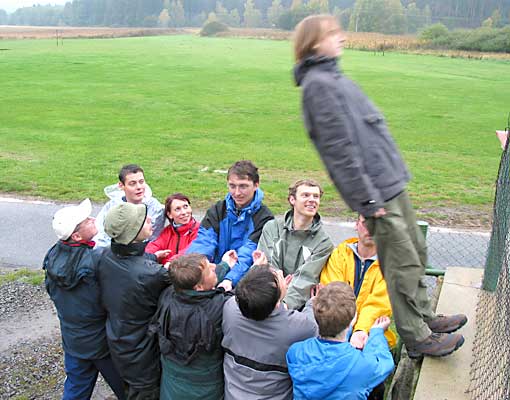 build trust - falling man caught by team