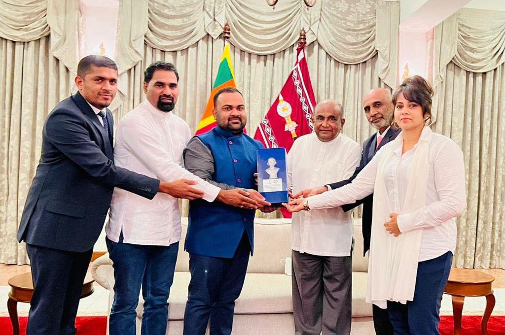 National Director Present a Commemoration Gift to the Hon'ble Speaker