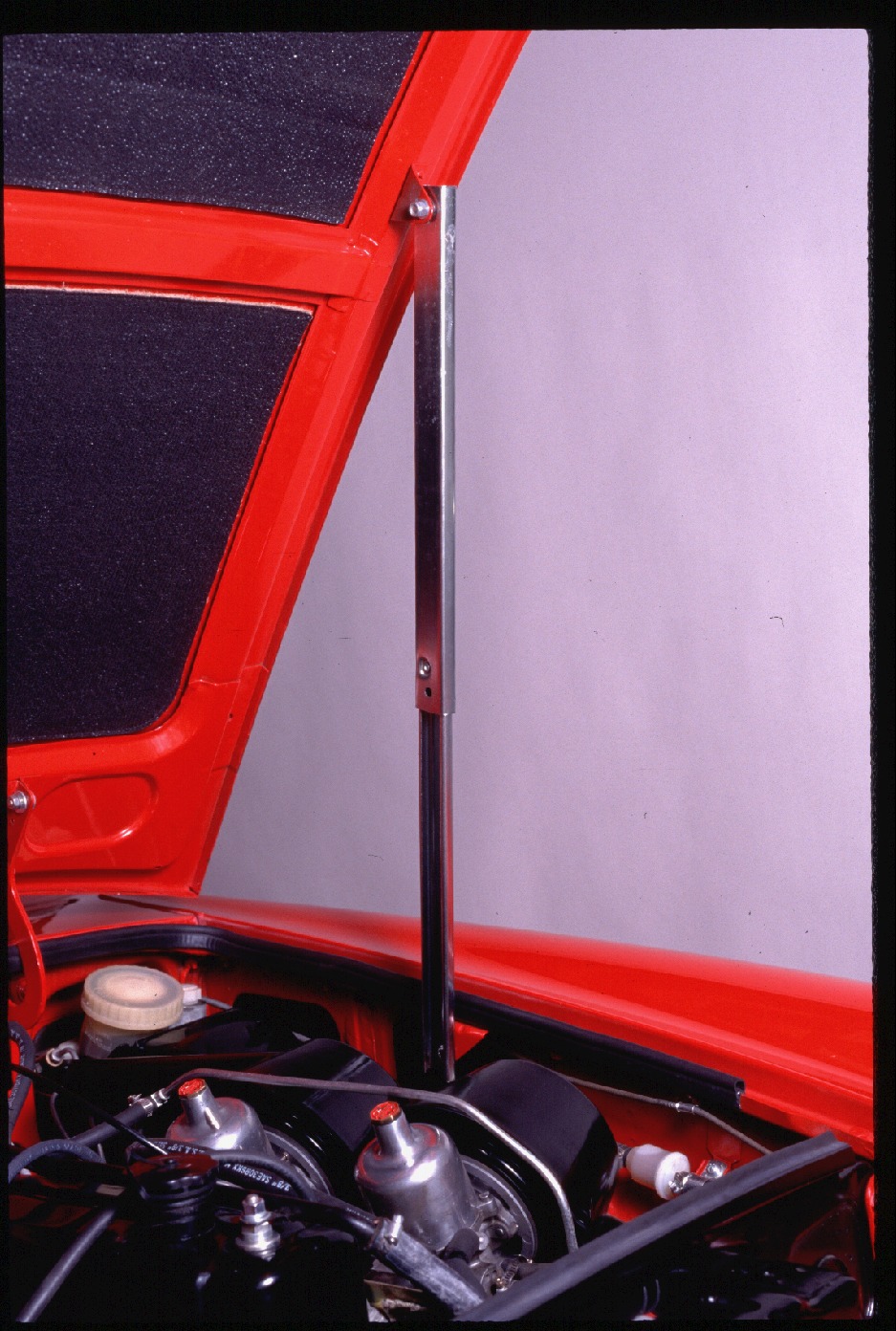 Clark & Clark Inc. Selftriggering Hood Props