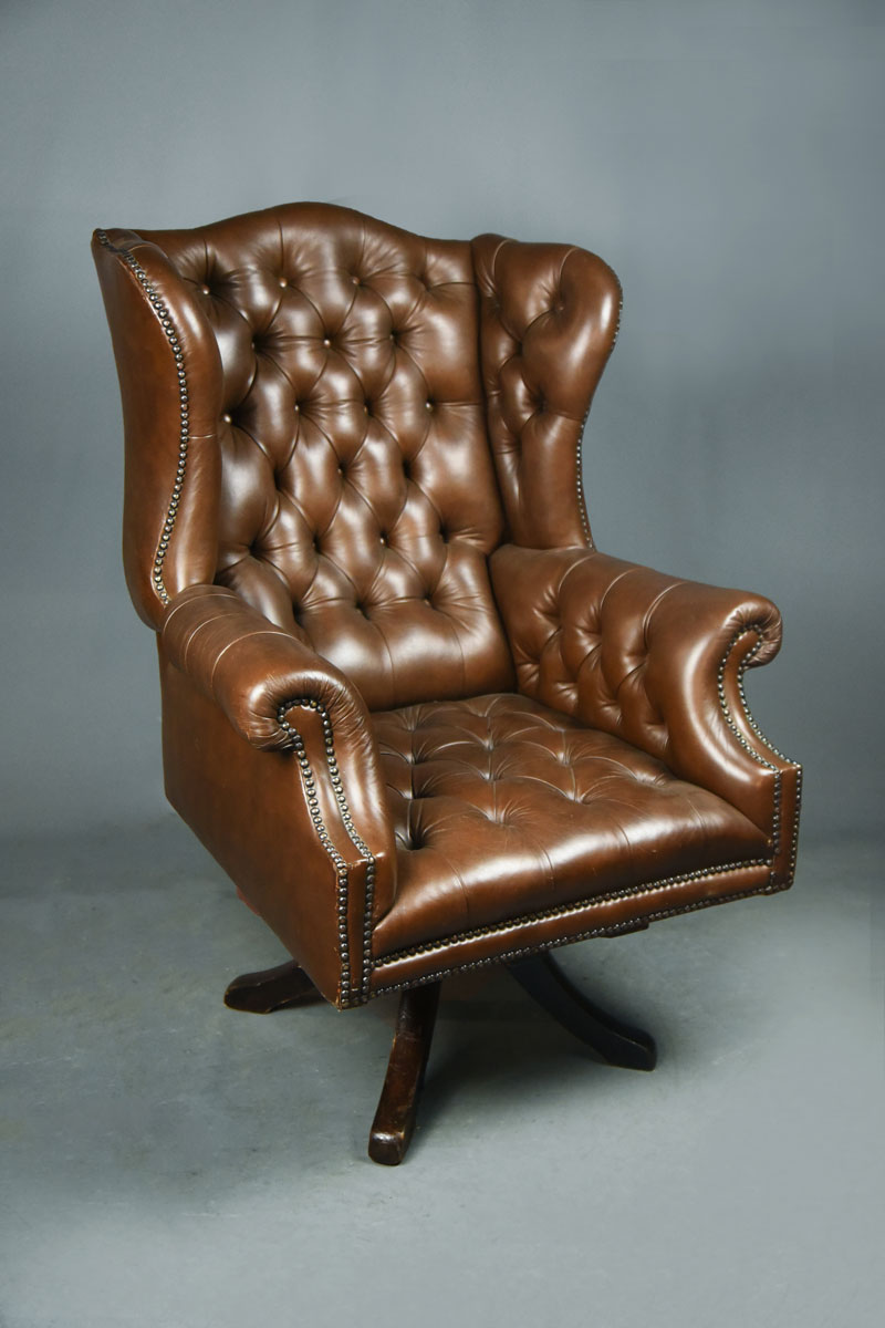 Brown Leather Swivel Desk Chair Brown Leather Button Wing Back Swivel Desk Chair The Classic Prop