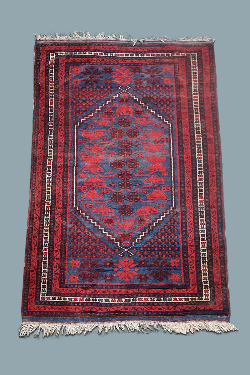 5'8" x 3'5" Red Oriental Style Rug The Classic Prop Hire Company