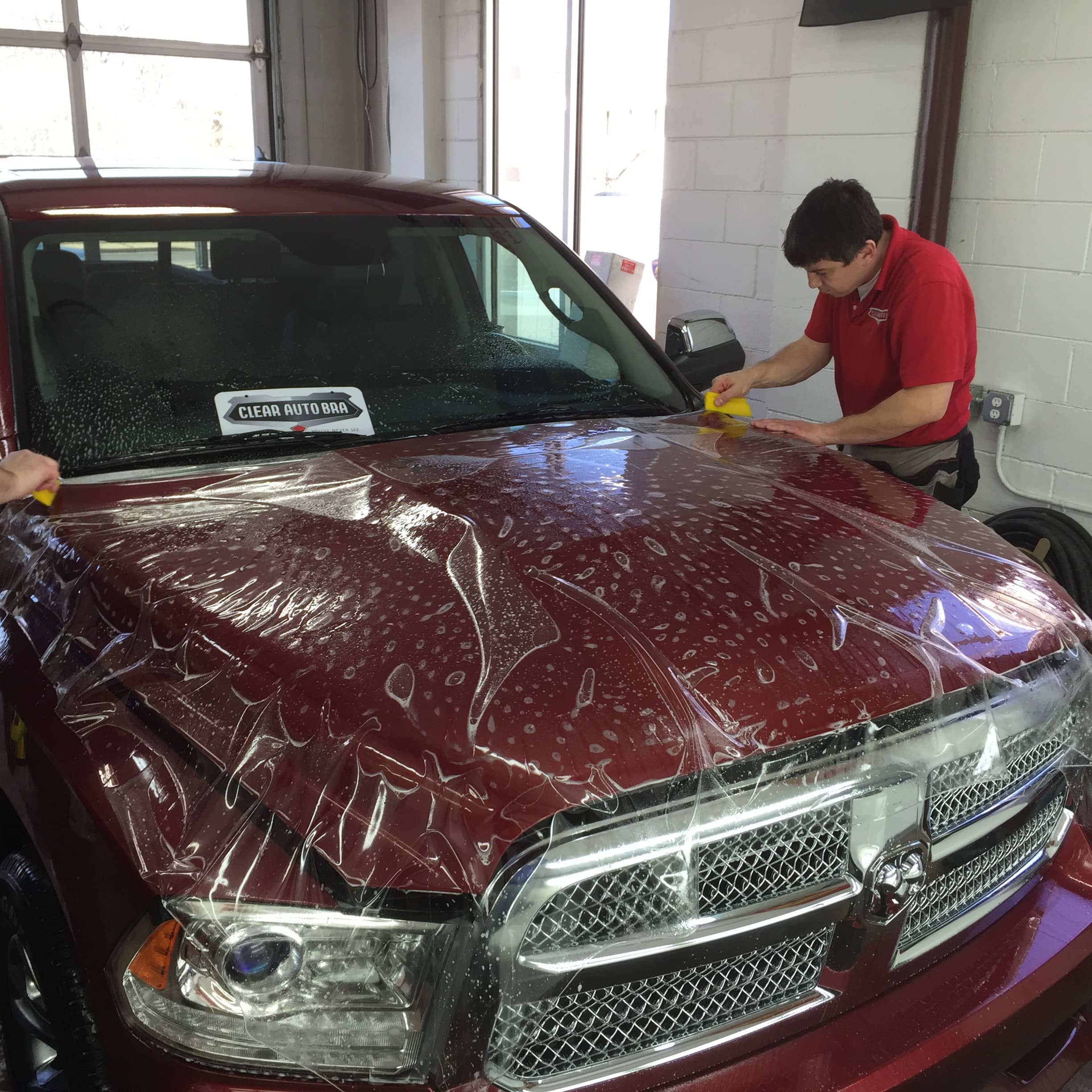 Dodge RAM 1500 covered in clear bra protective film Xpel installations