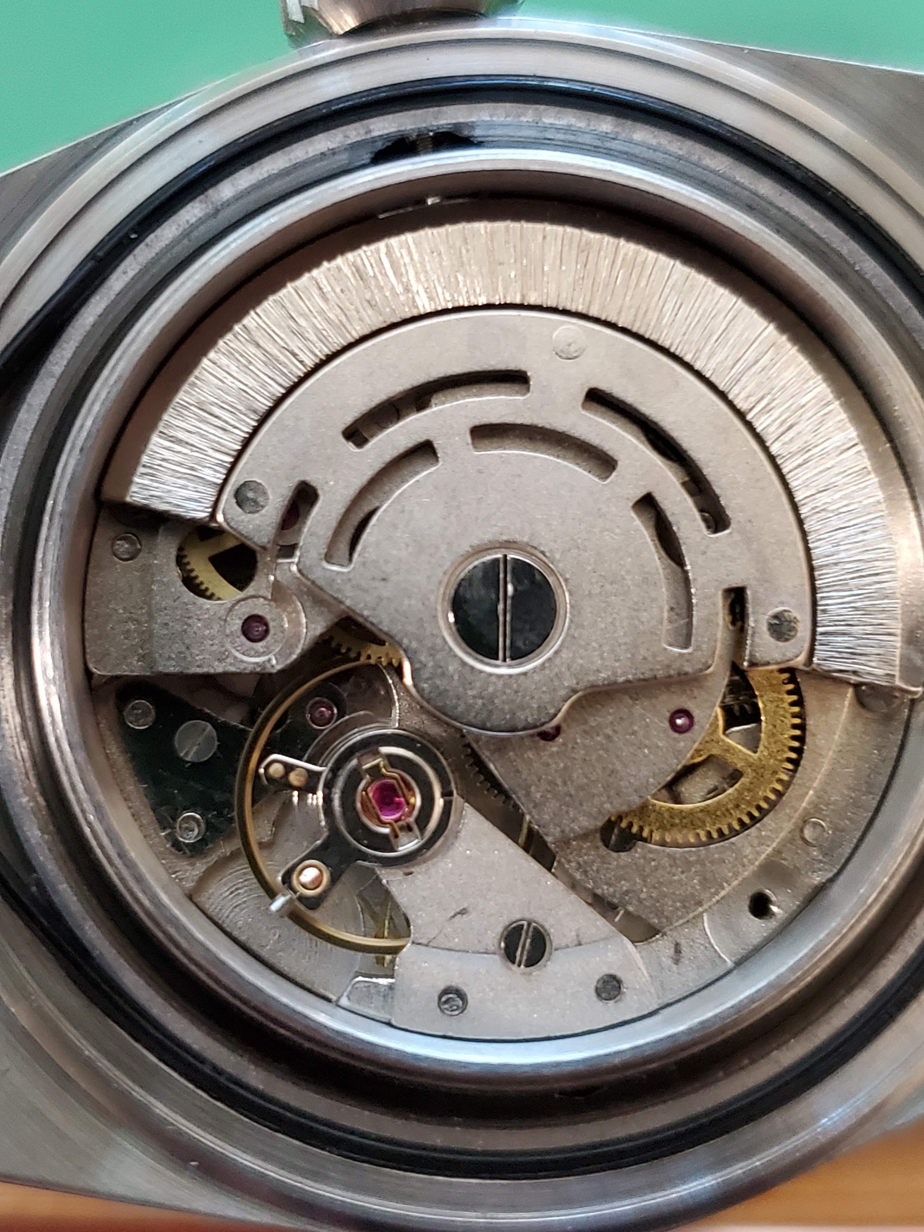 Need help identifying a Asian 21J automatic movement Replica Watch Info