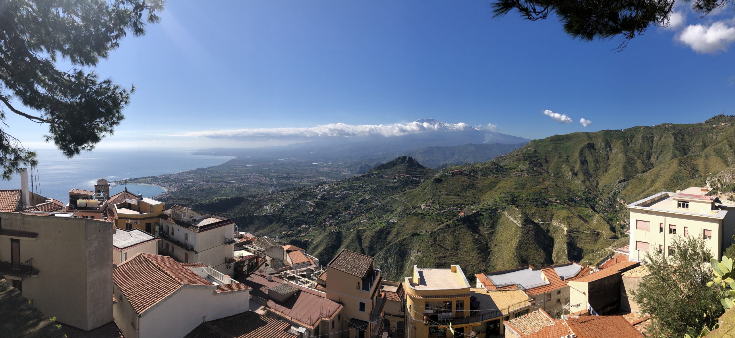 Mt. Etna, as viewed from the cliff-top village of Castelmola, Sicily.