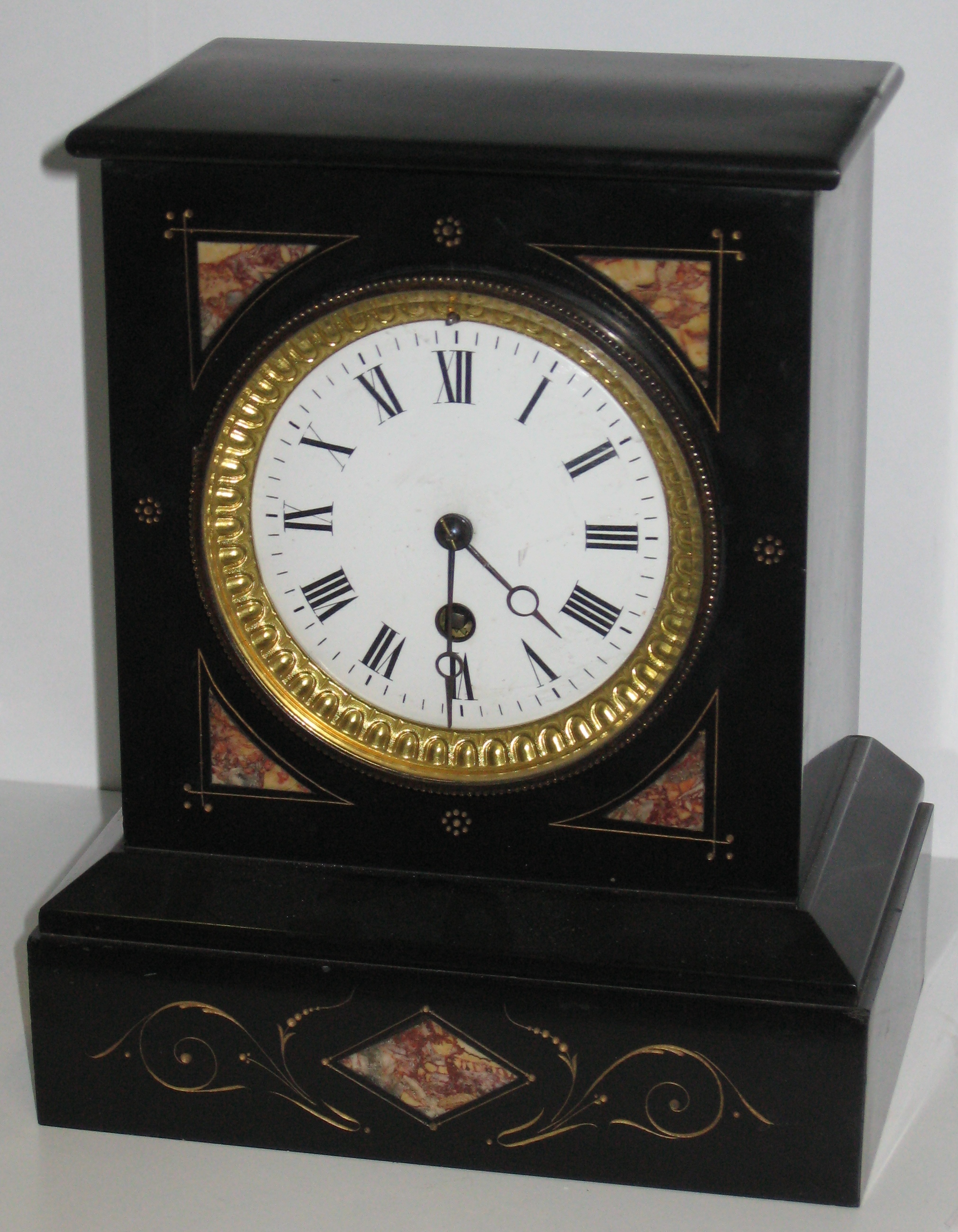 Securing French Clock Movements in the Case