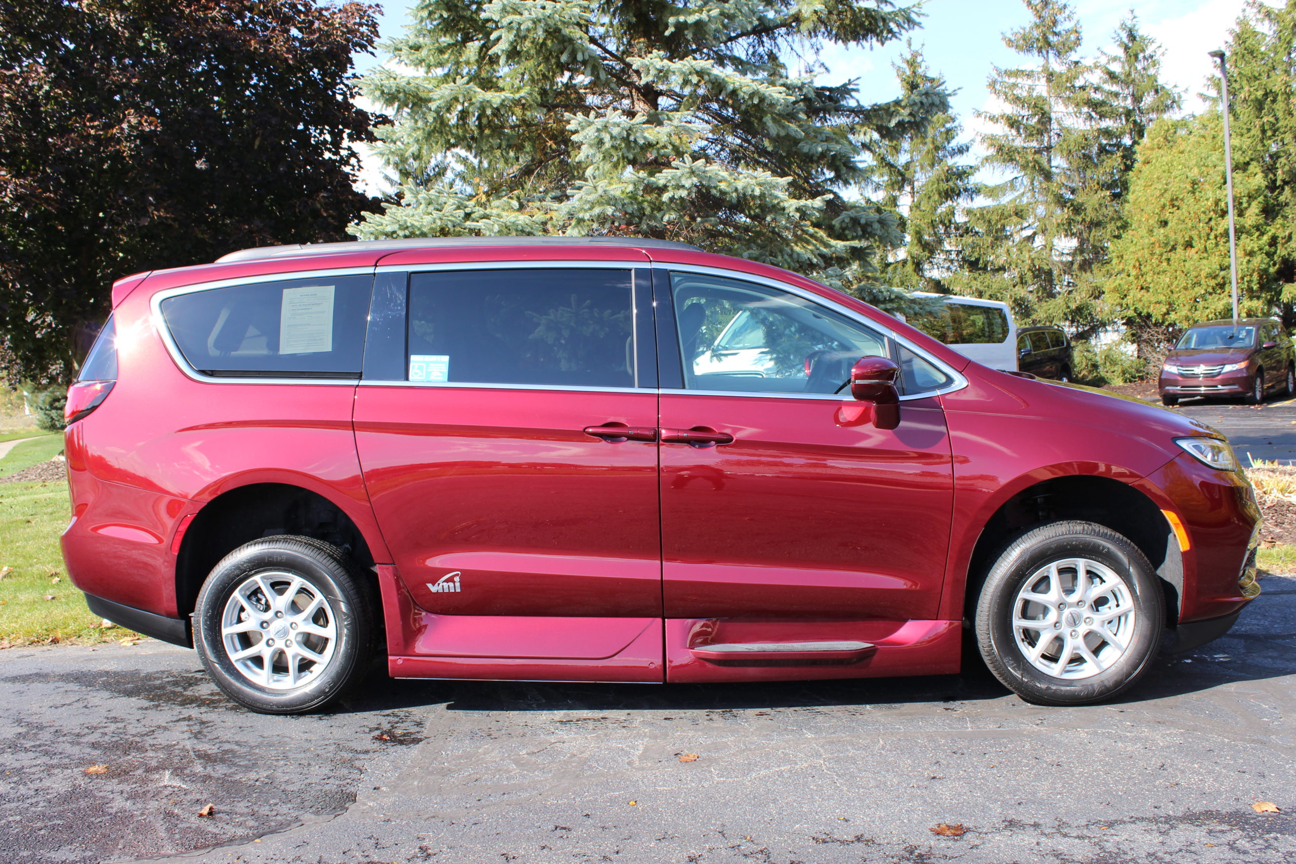 2022 Velvet Red Chrysler Pacifica Touring L with VMI Northstar