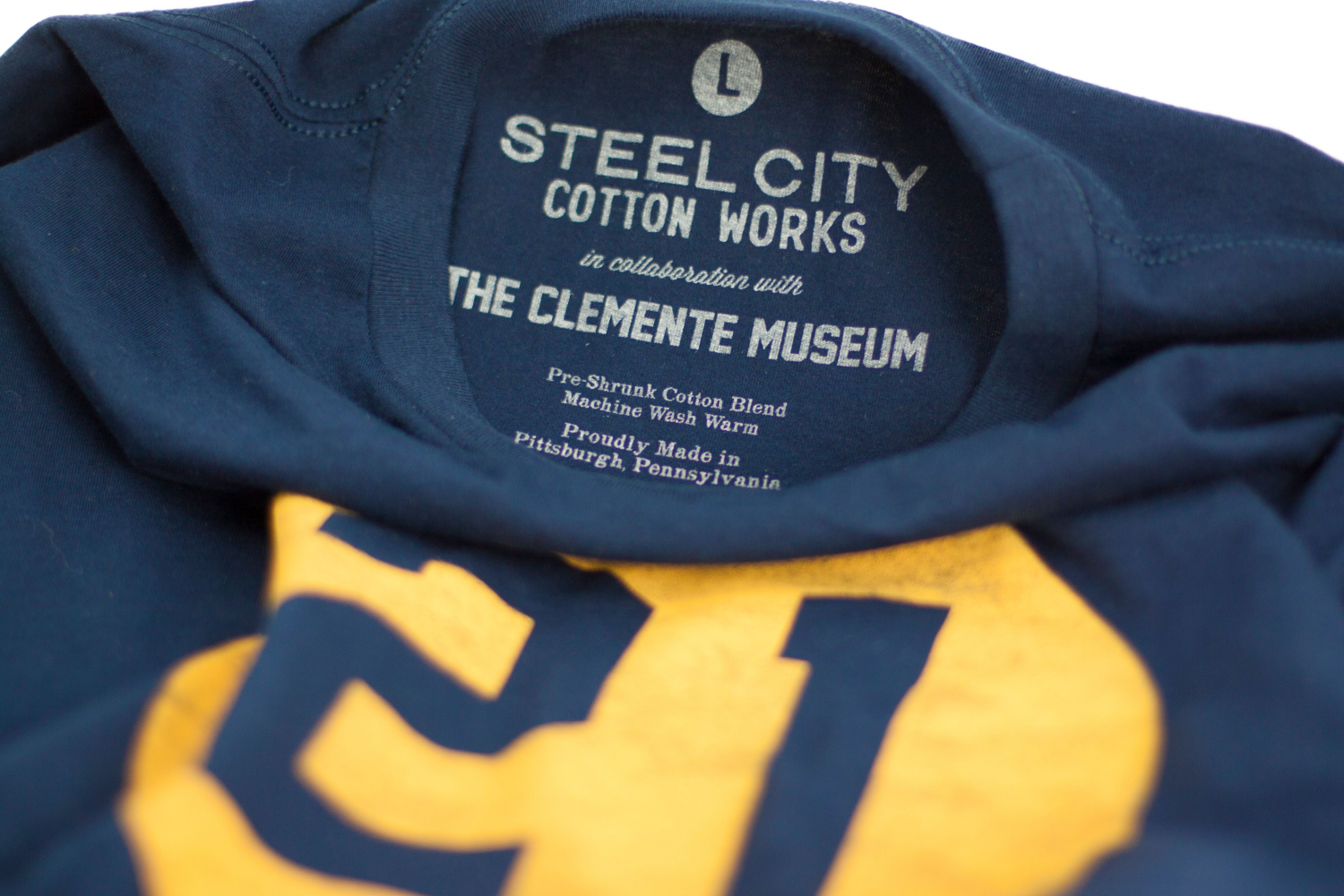 Clockwise A onecolor custom label on a navy tshirt. Printed for