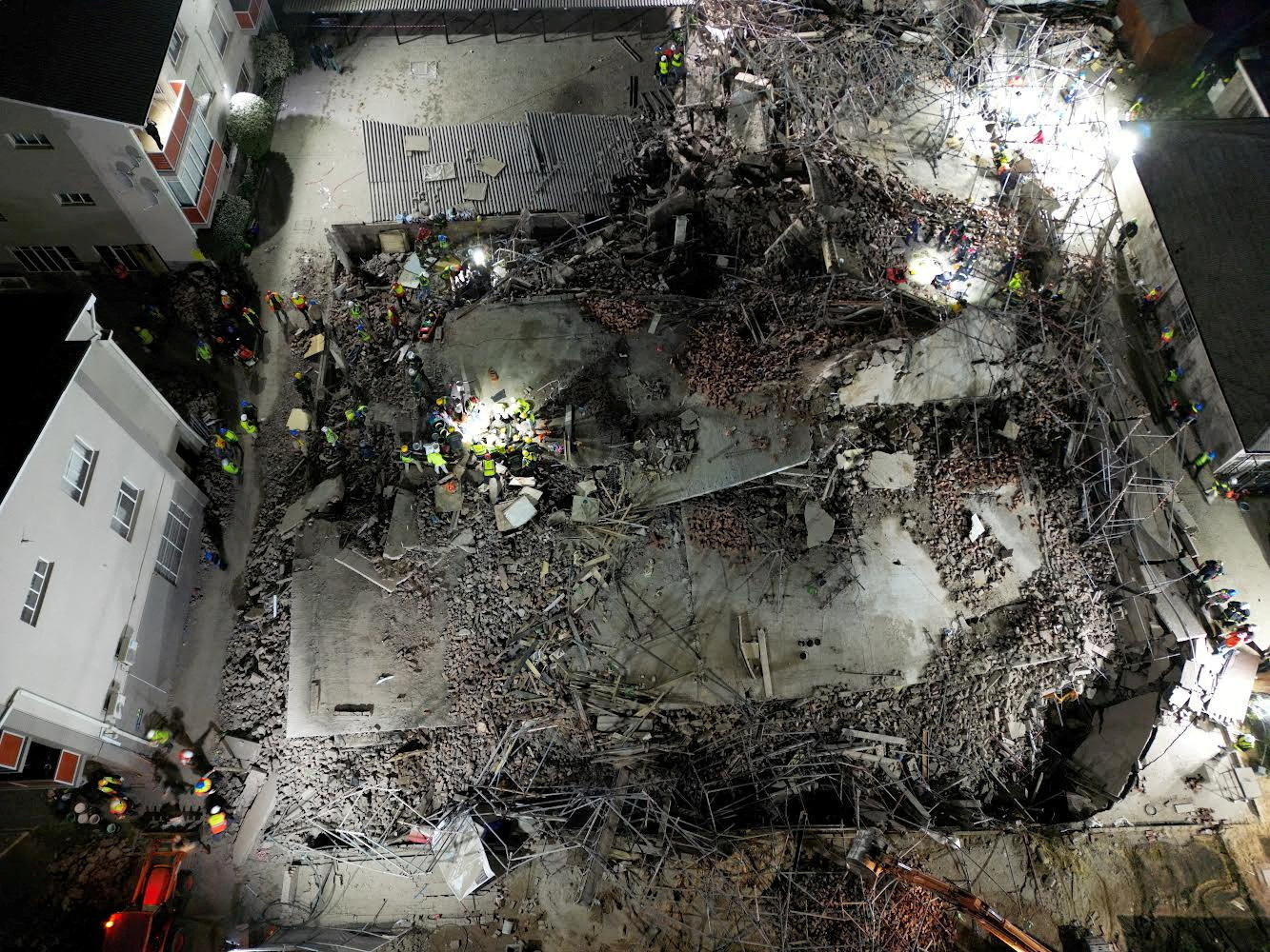 Building collapse in South Africa leaves three dead, dozens trapped