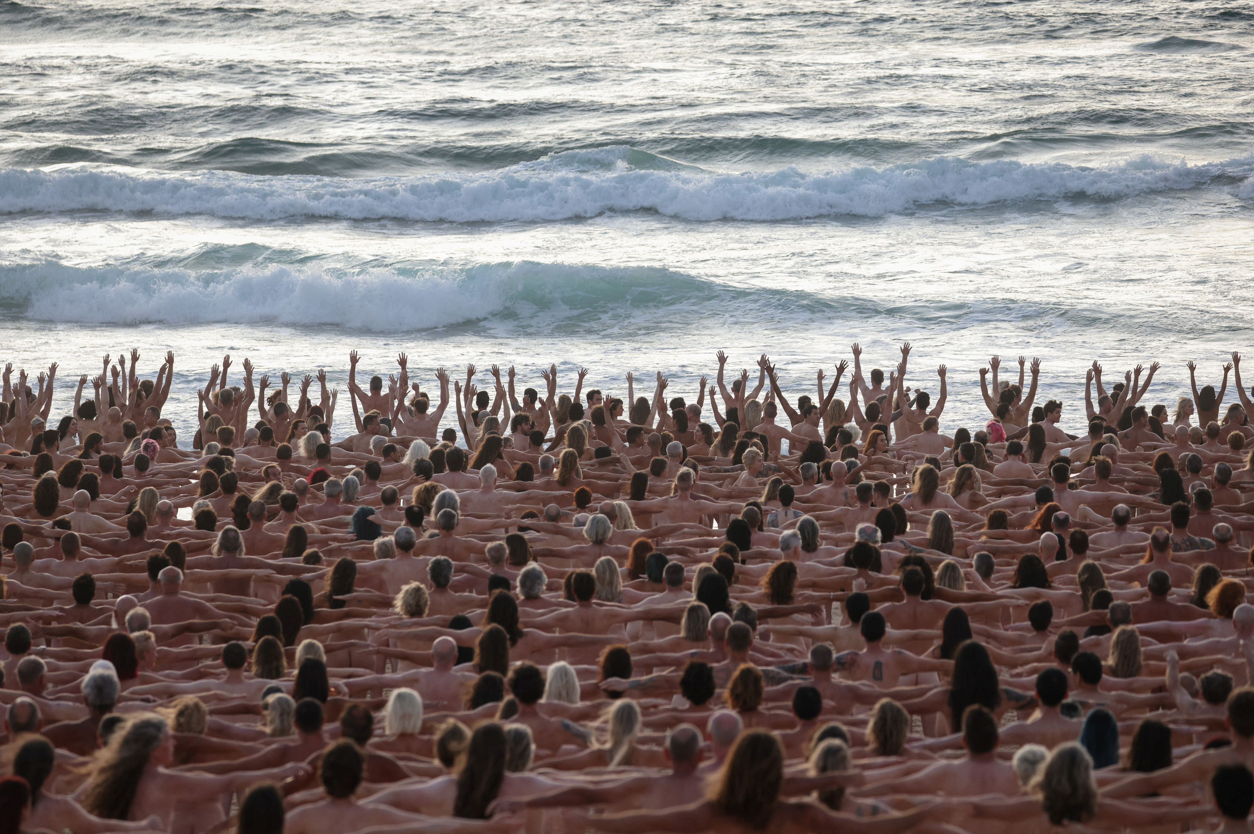 Thousands of Australians strip for Tunick cancer awareness photo shoot