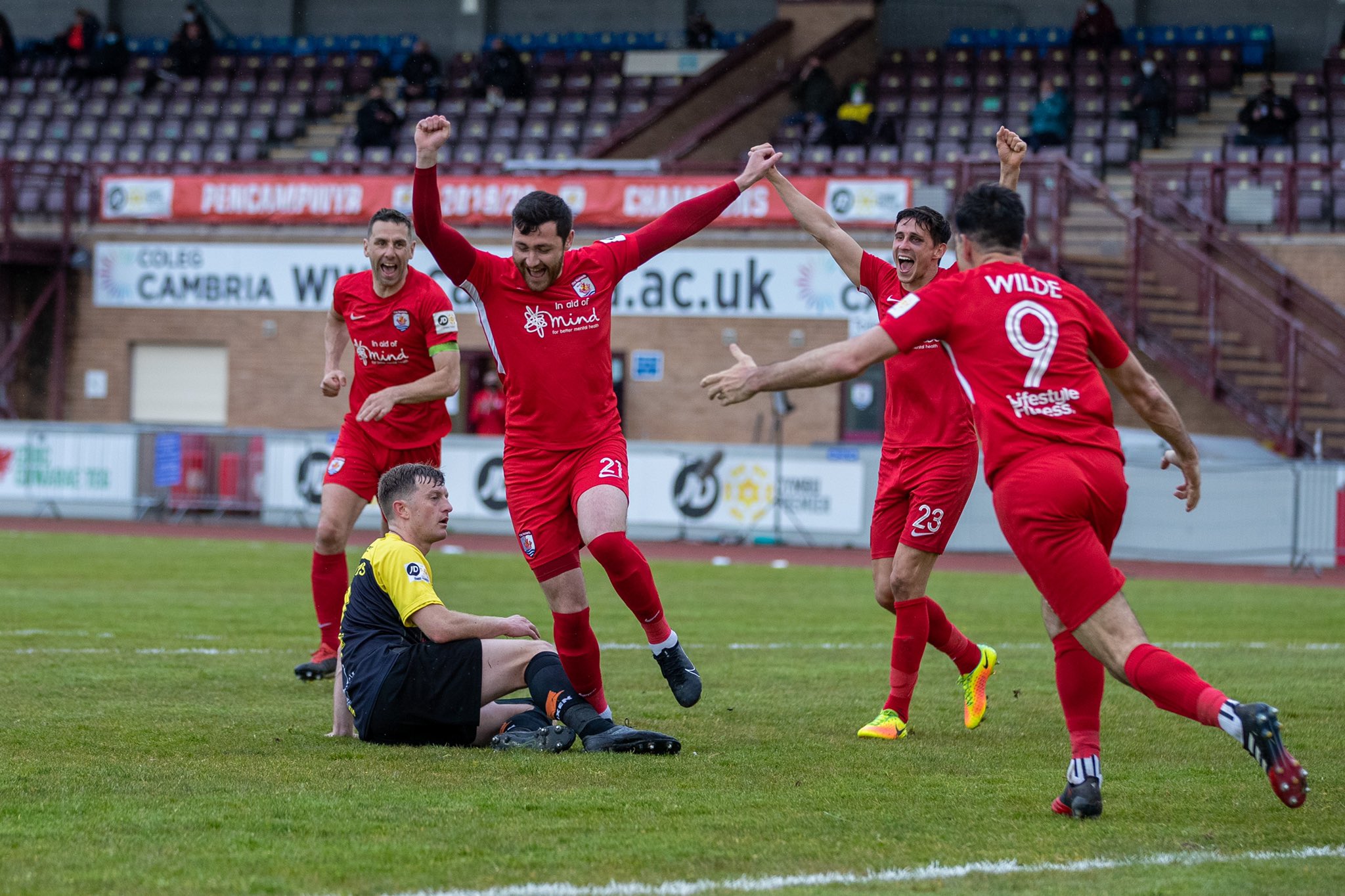 Connah's Quay demolish Caernarfon to earn top spot ahead of final day