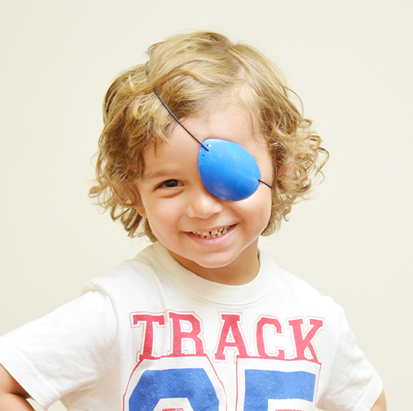 child wearing medical eye patch filed under , eye patch, medical eye patch