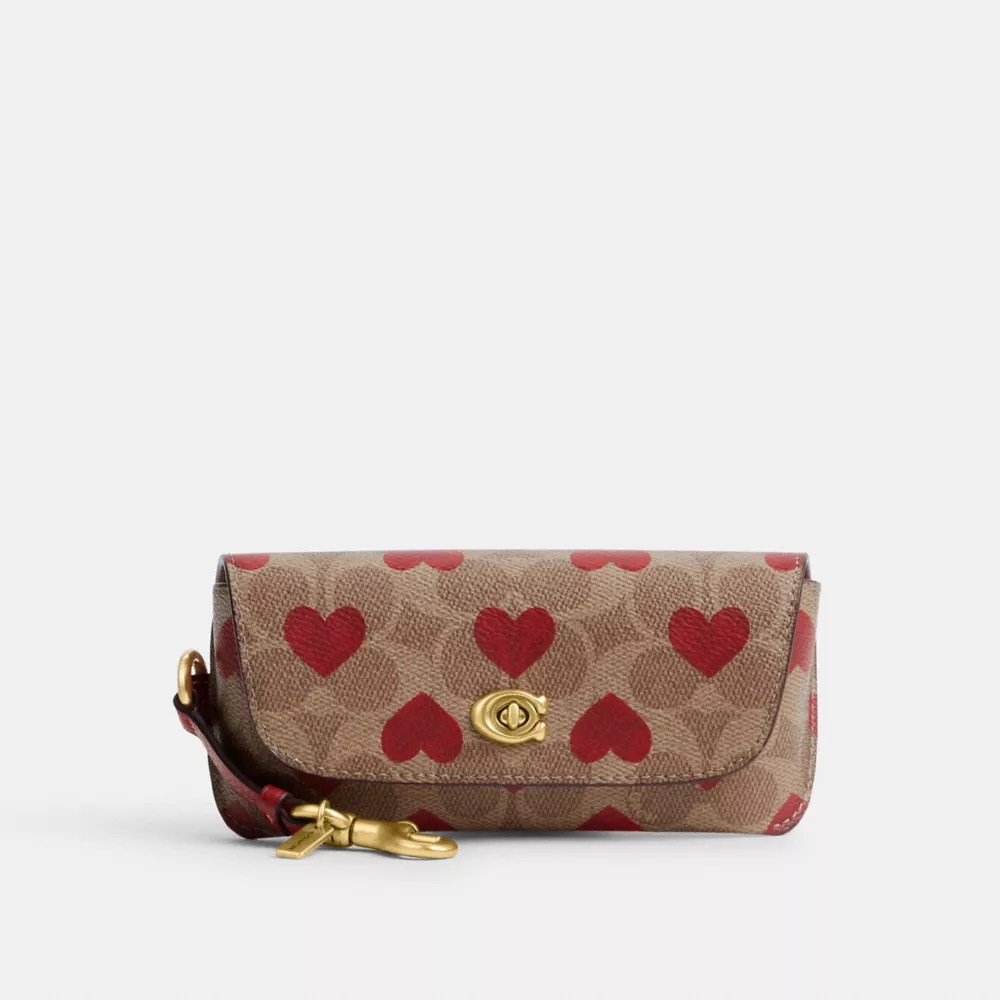 COACH® Outlet Sunglass Case Bag Charm In Signature Canvas With Heart Print